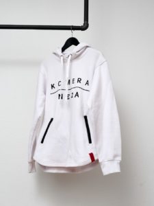 white zipper hoodie with black komera neza print logo