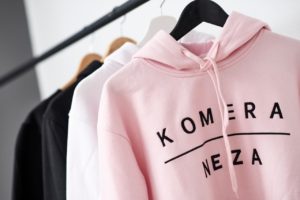 pink hoodie with black komera neza print logo