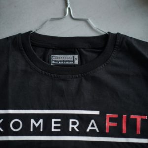 black t-shirt with black komerafit print logo