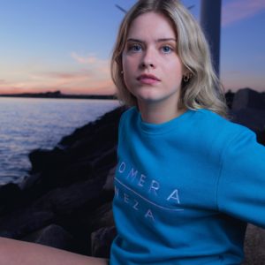 women's blue logo sweatshirt with embroidered komera neza logo