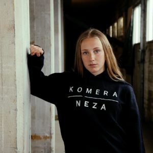 womens black logo hoodie with white komera neza print logo